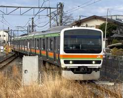 329985 B