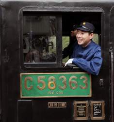 309329 B